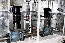 Industrial machinery with complex piping and valves for energy conversion.