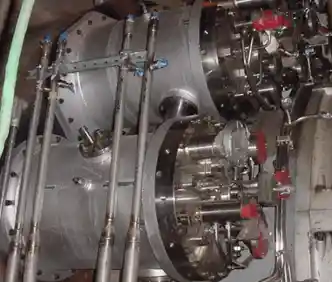 Industrial metal machinery with complex piping and valves