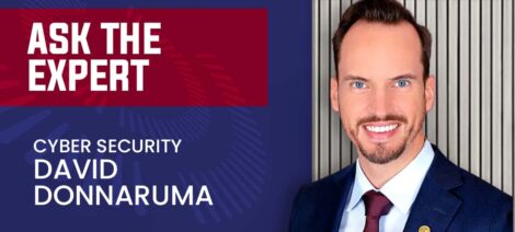 Expert in cybersecurity in a suited portrait with "Ask the Expert" banner.