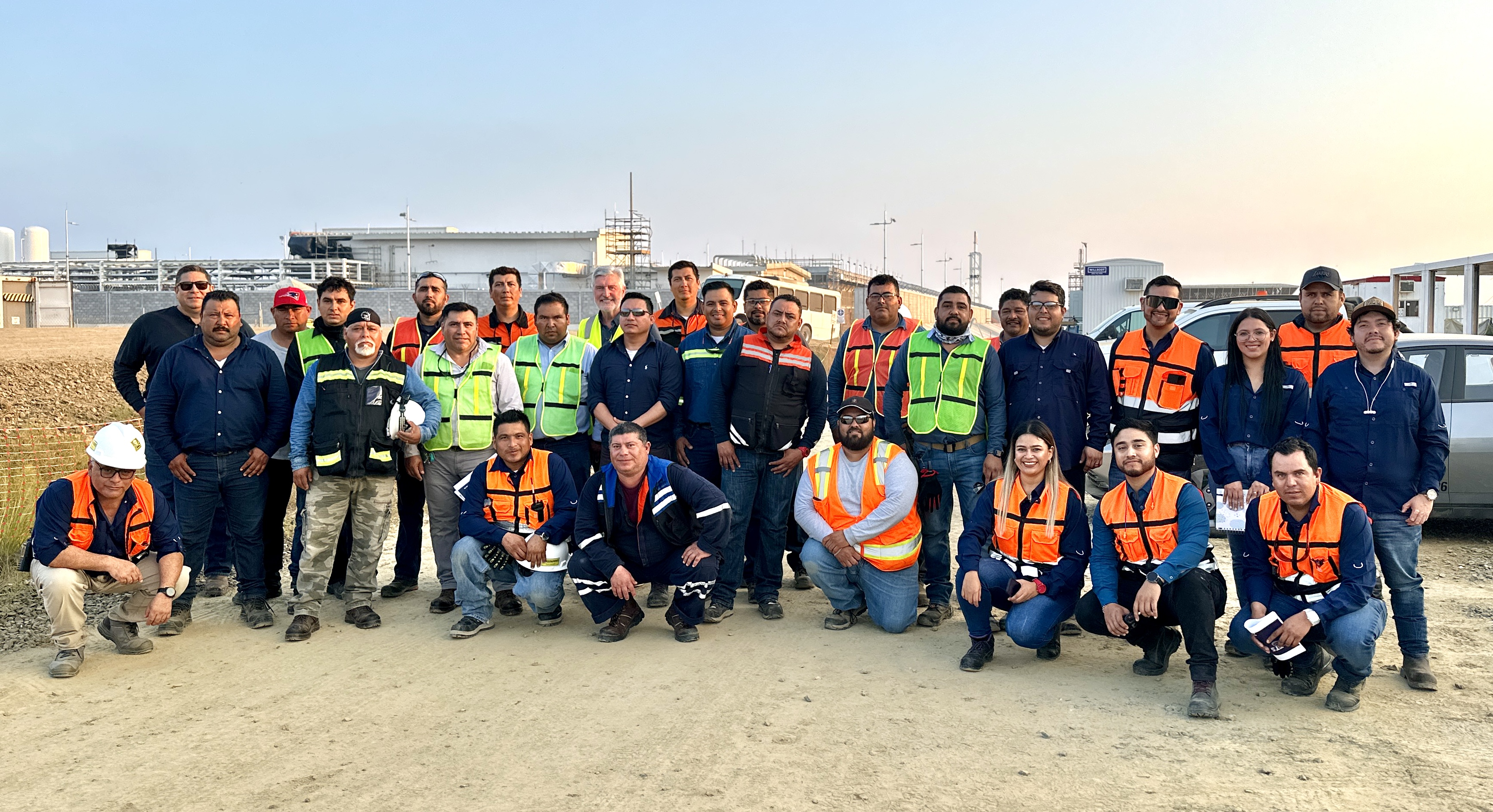 construction workers group in safety vests outdoors