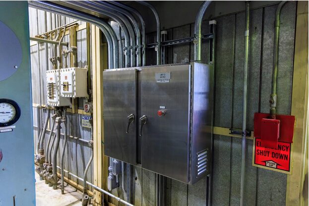 Industrial electrical control panel with emergency switch