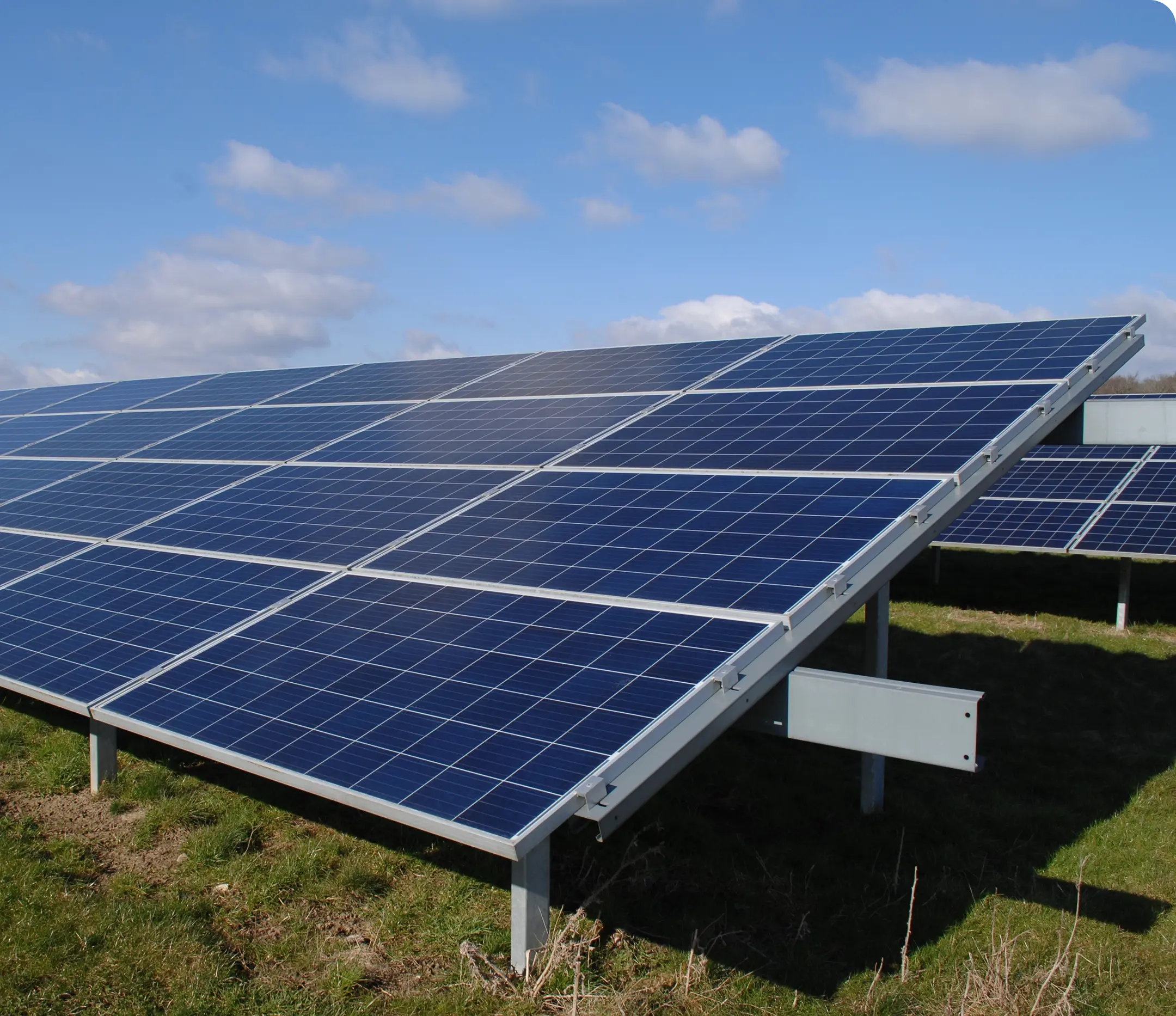Solar panels on metal frames in field