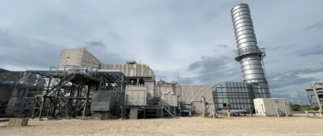 Industrial power plant with metal exhaust stack