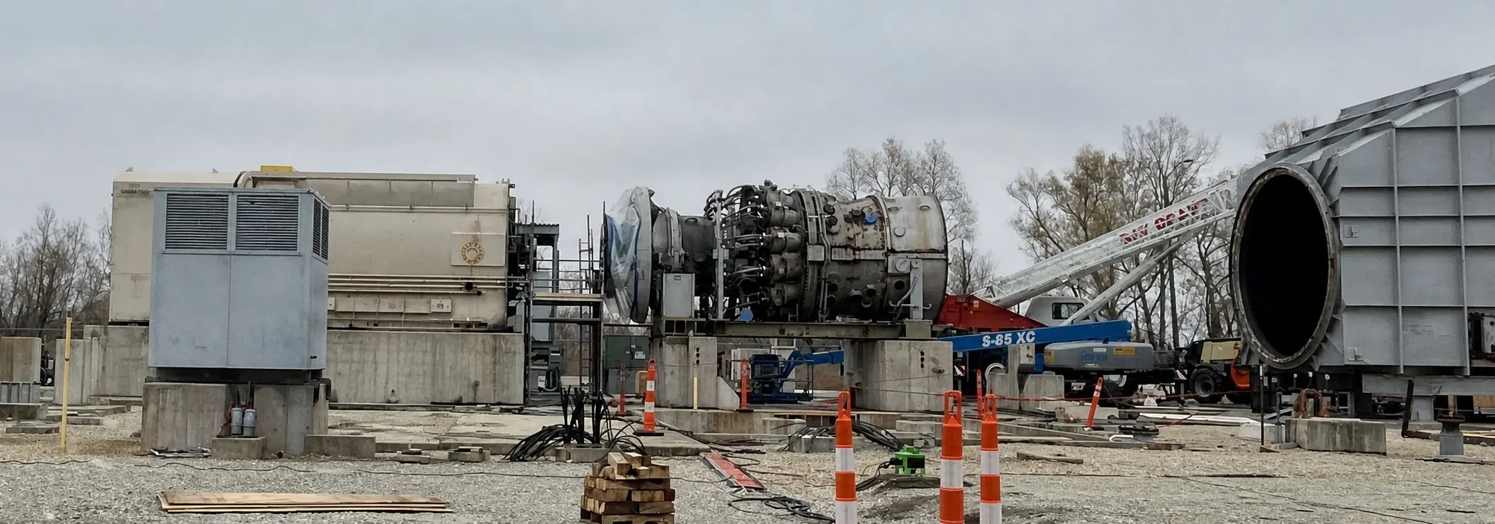 Industrial gas turbine engine on concrete platform